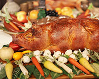 A pig roast is one of the best church fundraising ideas to bring your congregation together for food and fellowship.