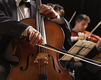 Host a seasonal orchestra performance and charge for entry for this church fundraising idea.