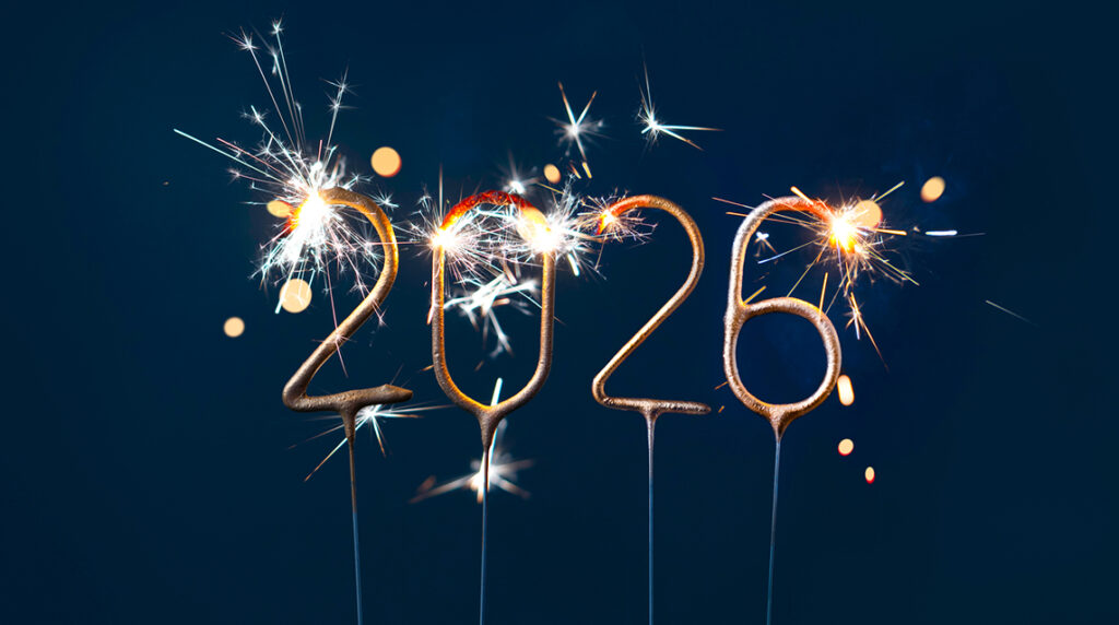 Glowing sparkler numbers forming New Year 2026 on a dark background, symbolizing emerging nonprofit trends and the shift toward the year ahead.