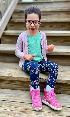 Renna Sitting on the Stairs