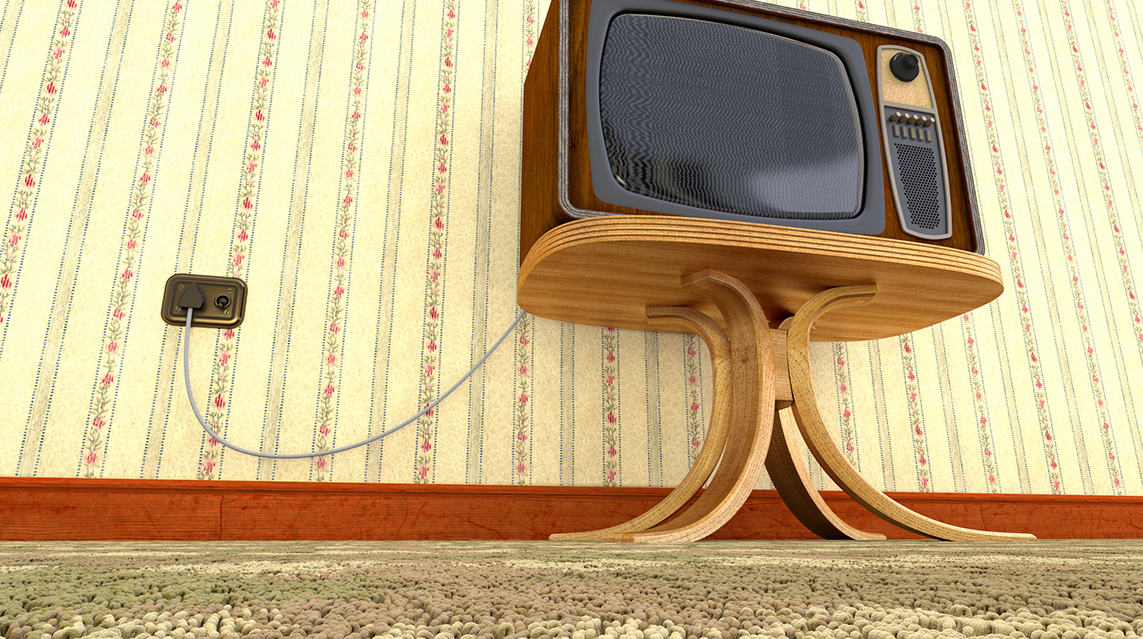 A 1970s style TV set in an simple room setting. Shot really low to turn the carpet into foreground interest.