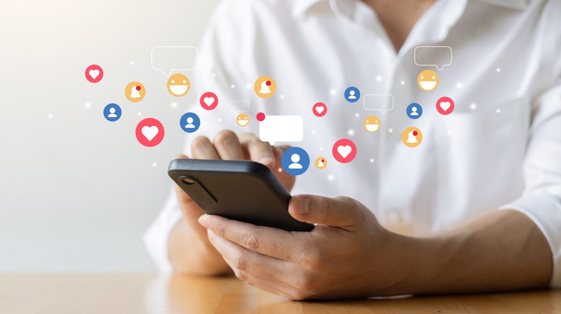 A person engaging a social media audience online to promote their fundraiser.
