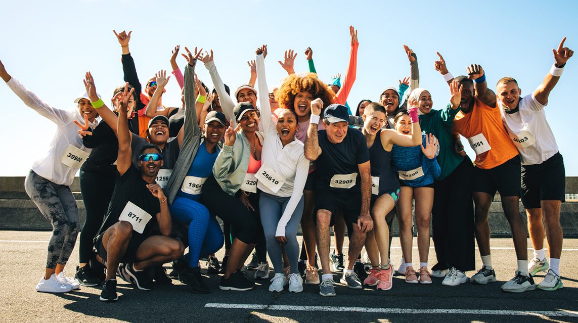 A group of runners prepare for a fun run.